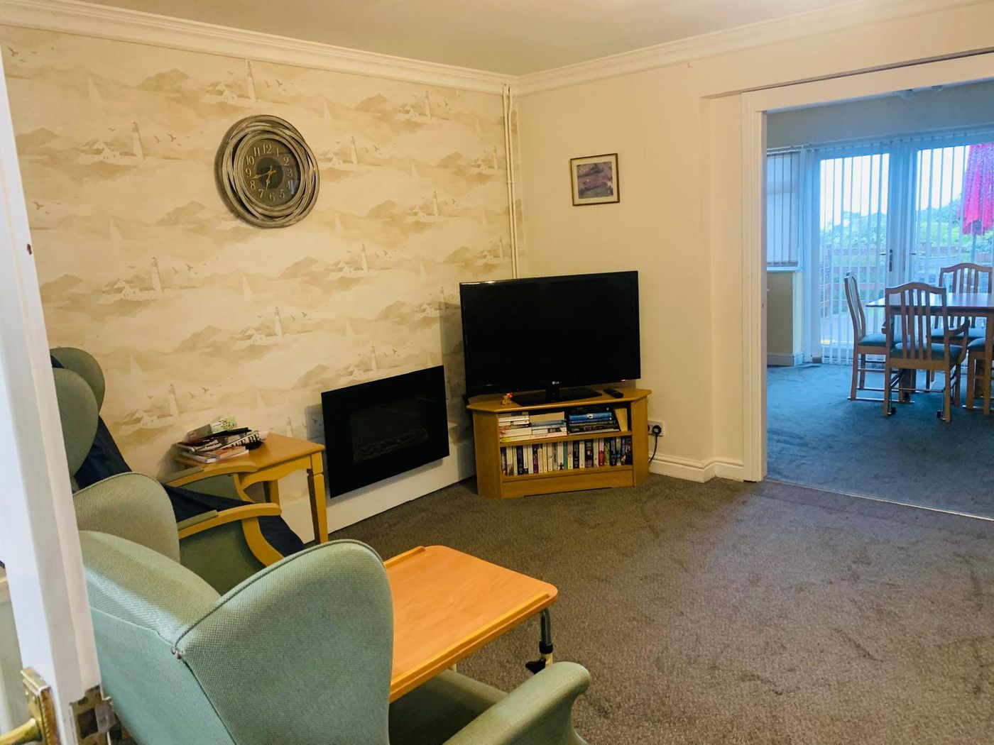 The lounge with dining area beyond