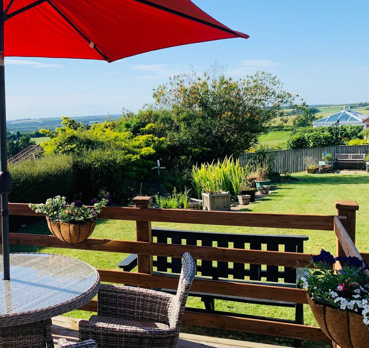 Patio seating overlooking the garden