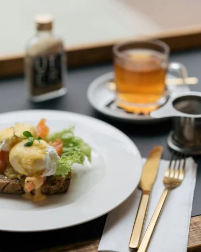 A freshly prepared meal with a cup of tea